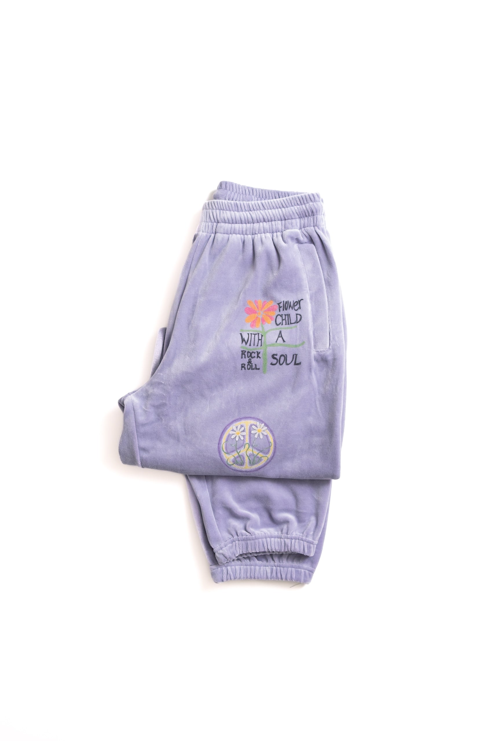 Purple sweatpants with text and graphics on a white background