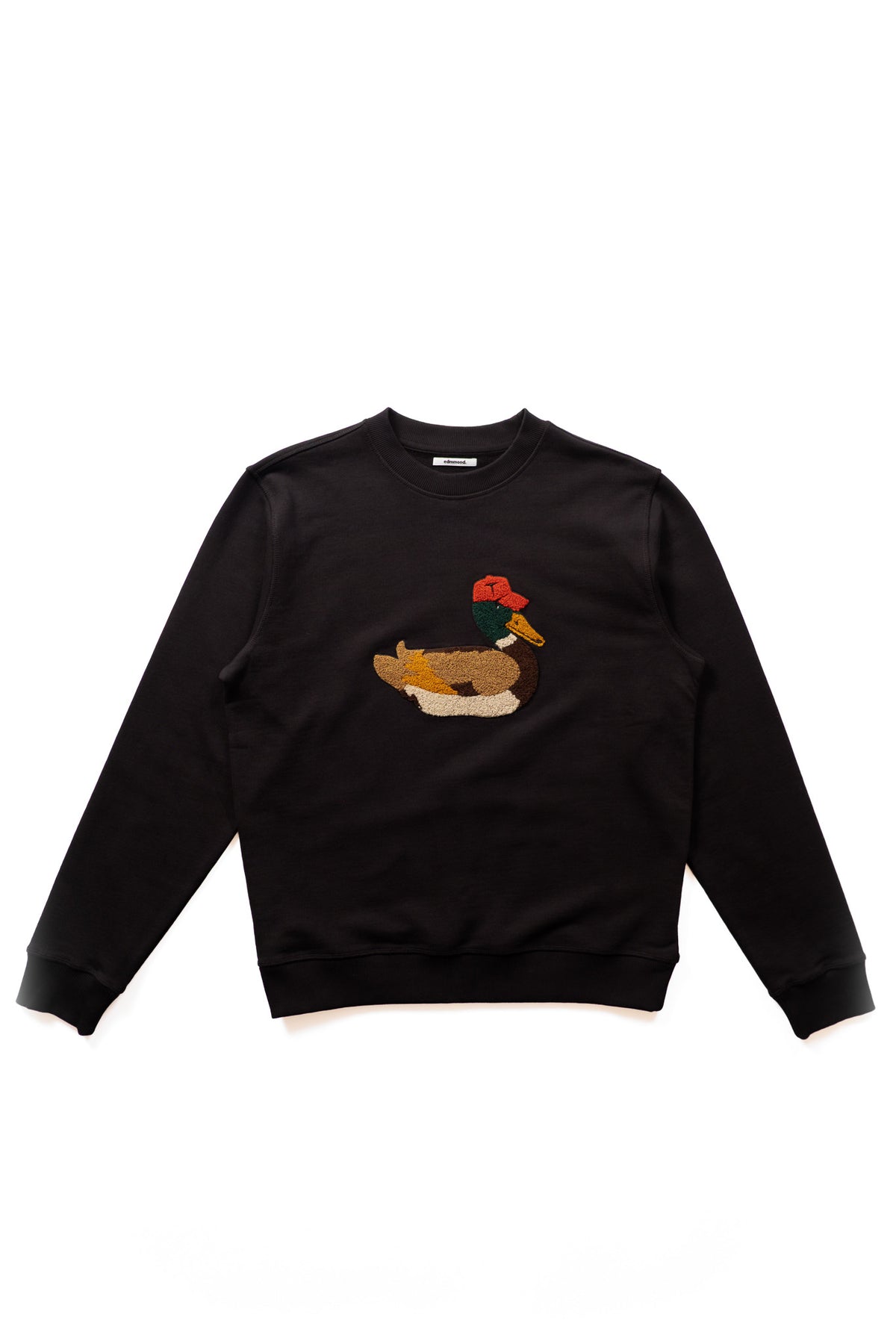 A black crewneck sweatshirt featuring a central graphic of a duck wearing a red baseball hat, displayed flat against a solid white background.
