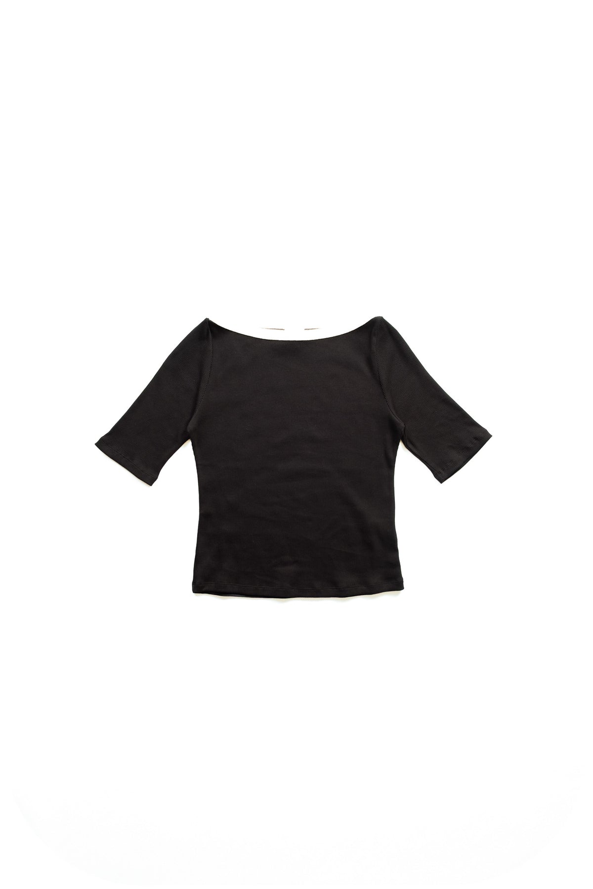 A black short-sleeve top with a wide boat neckline, and cream contrast along the neck laid flat against a solid white background.