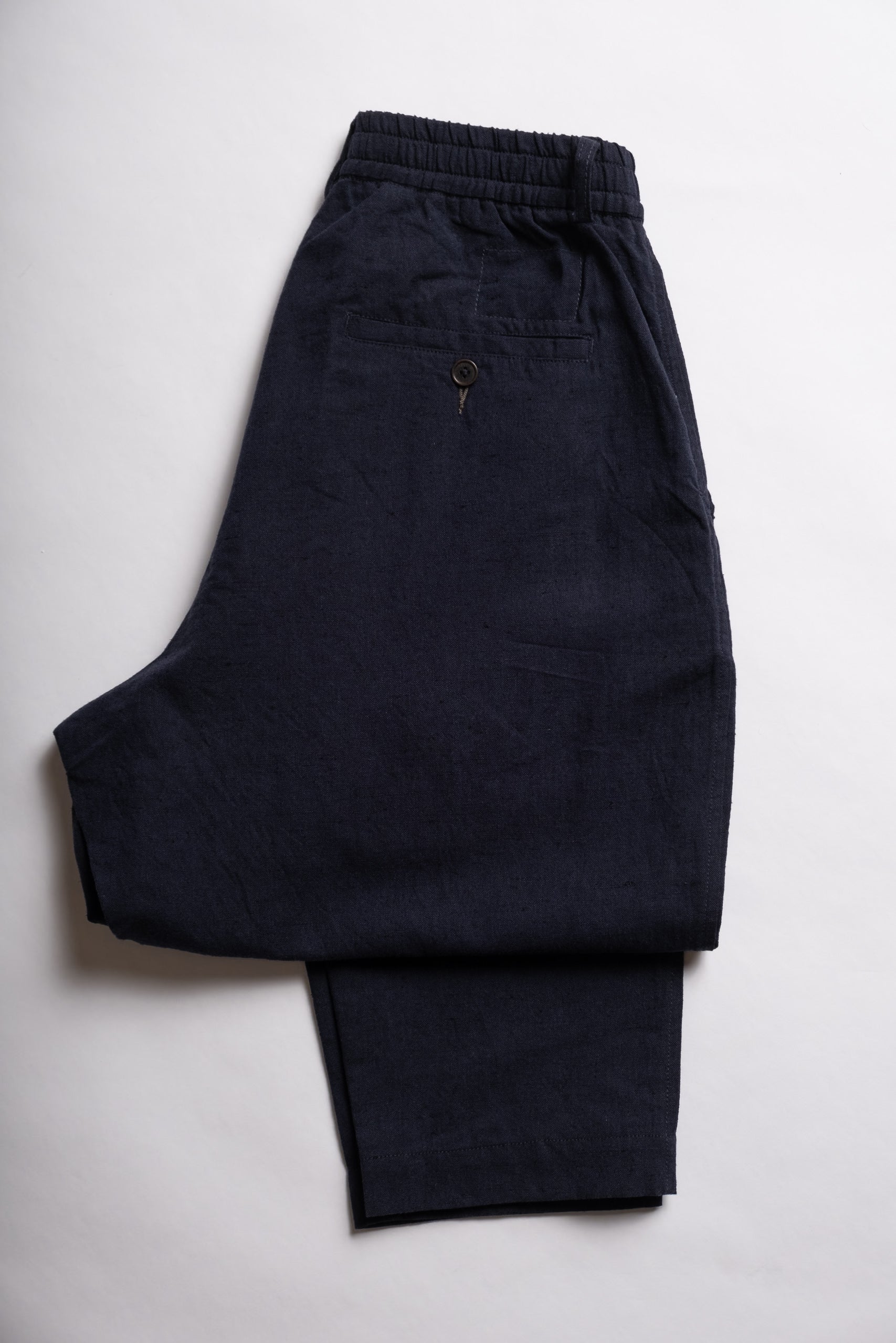 PLEATED TRACK PANT - NAVY LORD COTTON