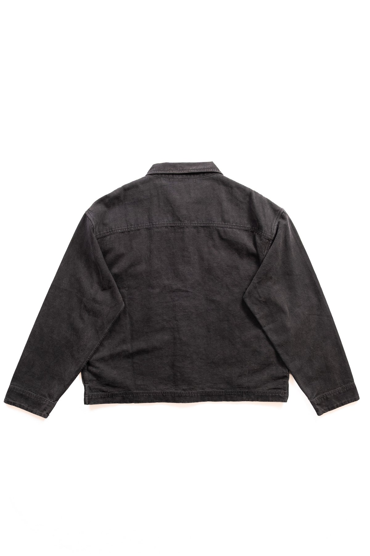 A dark charcoal gray ripstop jacket shown from the back, laid flat against a solid white background.