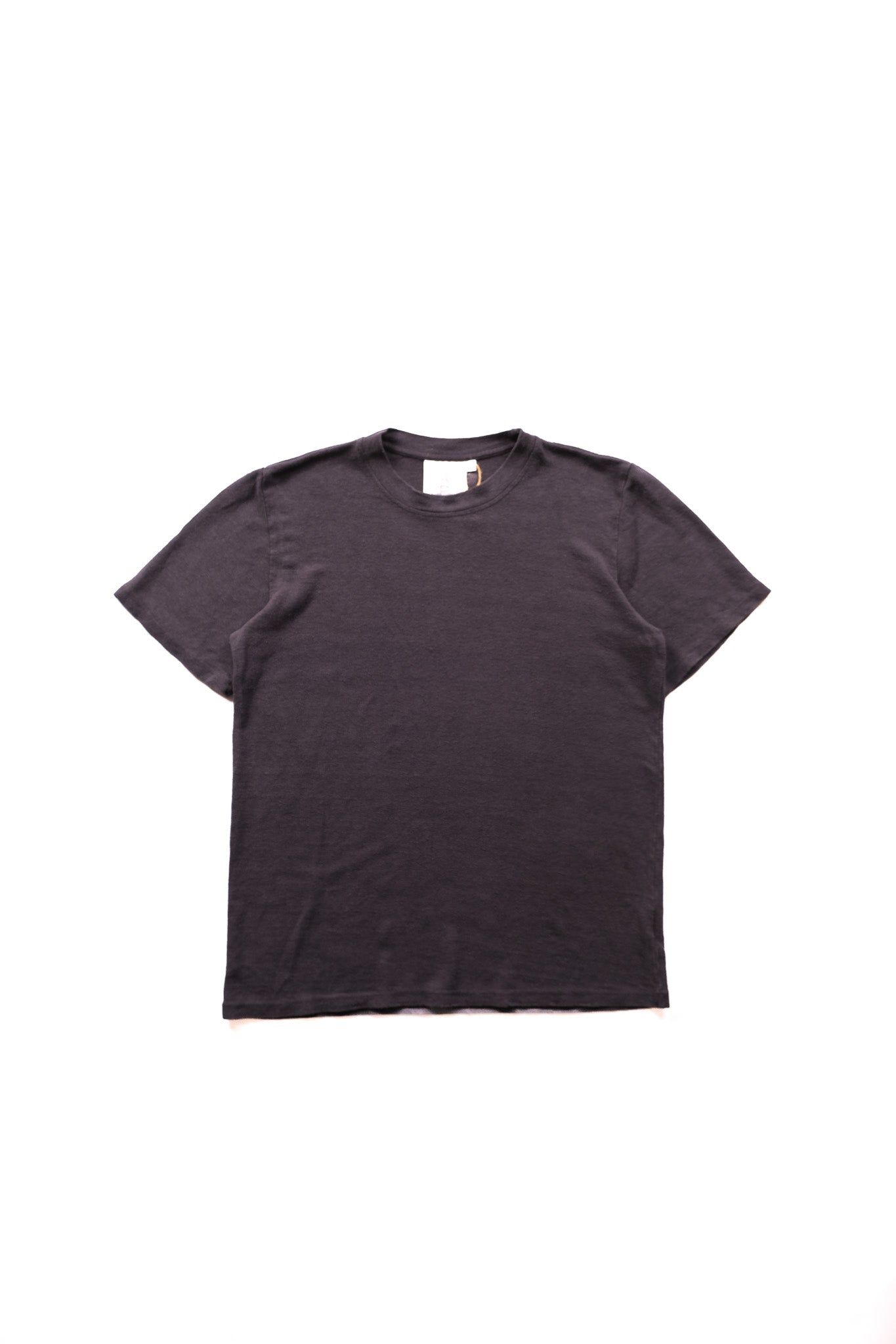 A navy short-sleeve crewneck t-shirt laid flat against a solid white background.