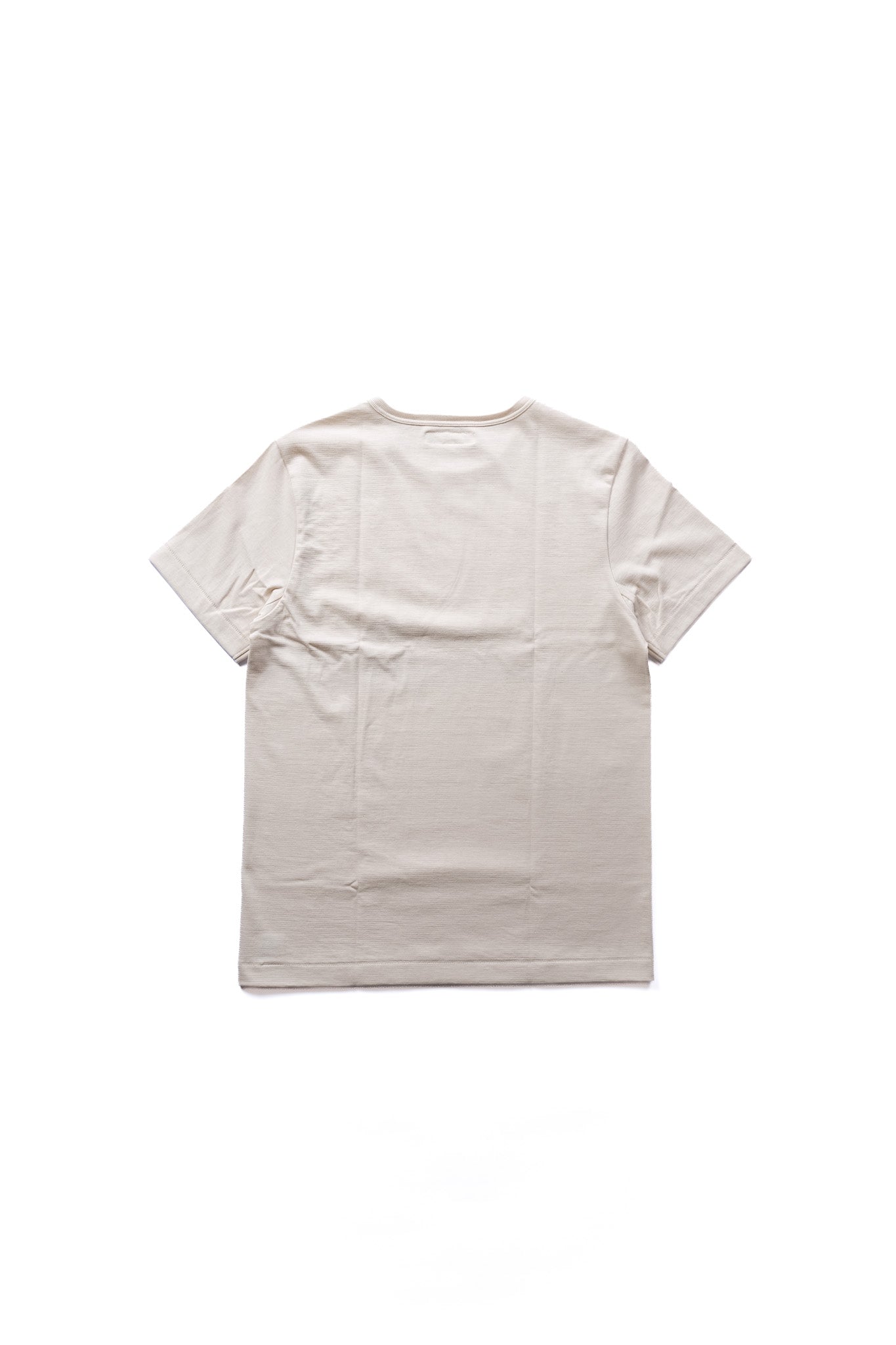 A light beige short-sleeve t-shirt shown from the back, laid flat against a solid white background.