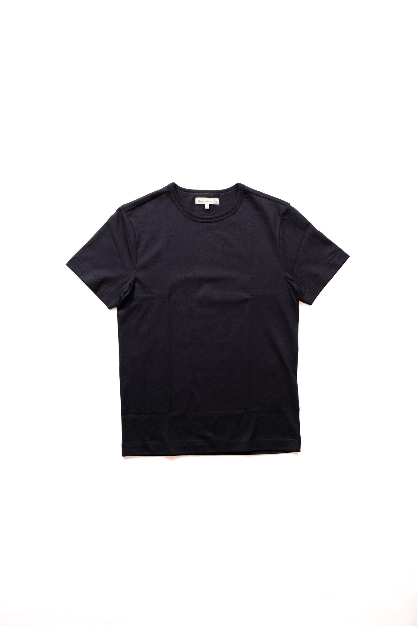 A plain ink blue short-sleeve crewneck t-shirt laid flat against a solid white background.