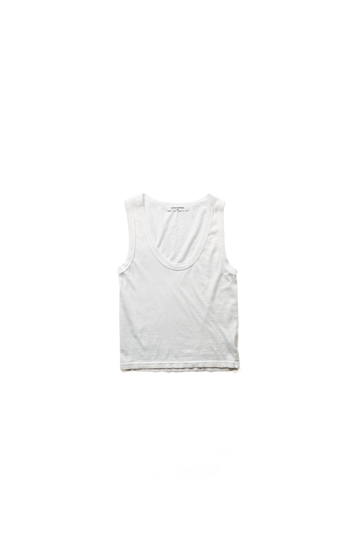 white cropped sleeveless tank top laid flat on white background 