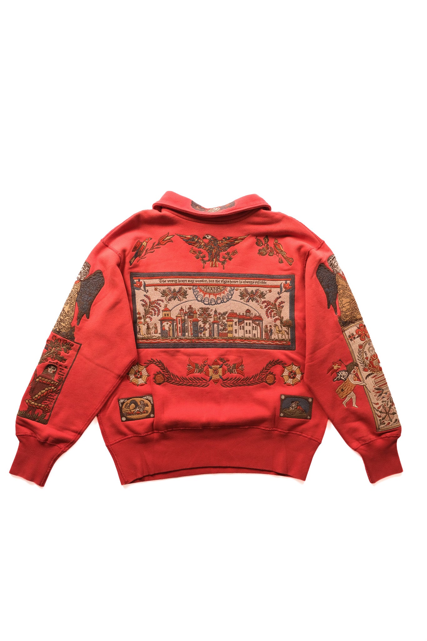 A red  1/4 zip shown from the back, featuring an intricate, multi-colored tapestry-style graphic print across the back panel and sleeves with traditional motifs.